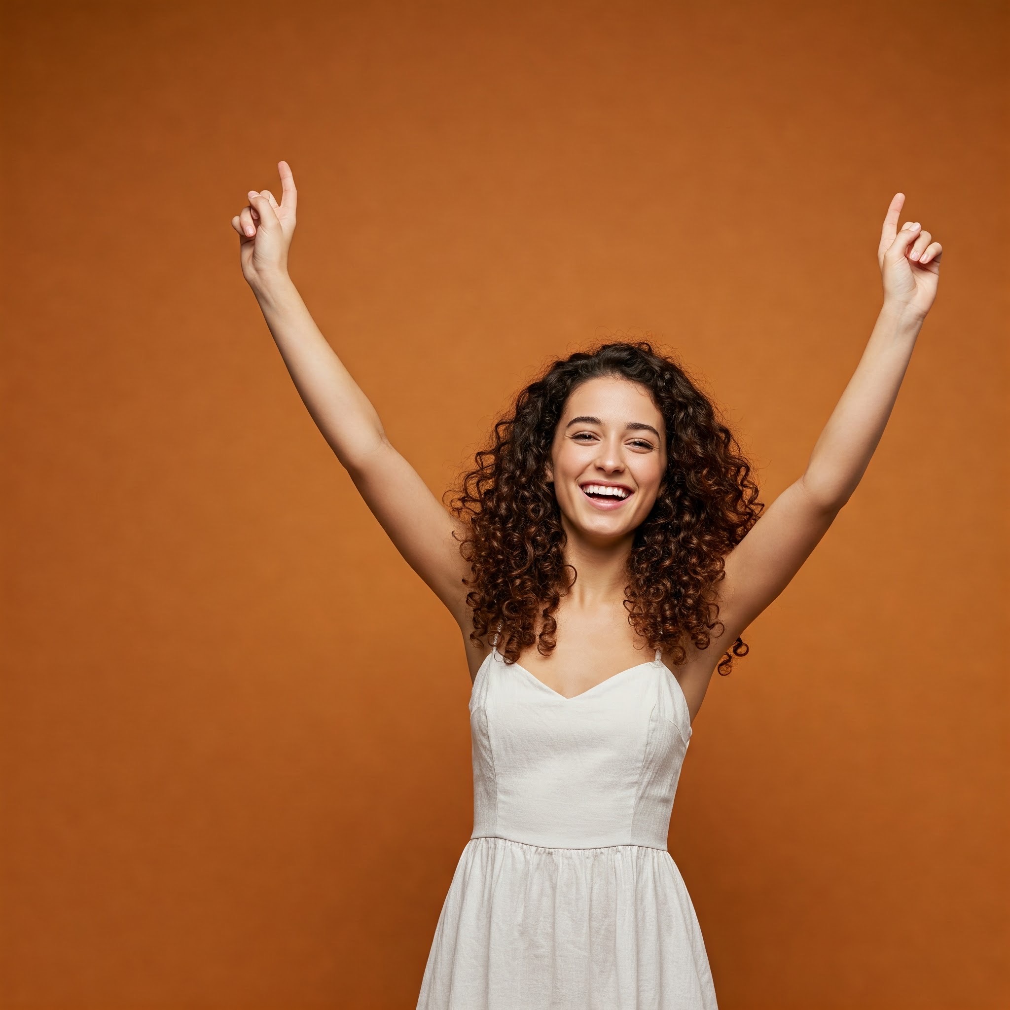 photo of Cheerful Woman with Arms Raised
